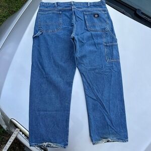 Faded heel bitten Dickies carpenter jeans